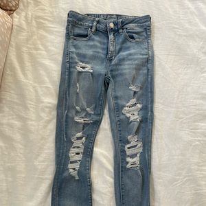 High waisted distressed jeans